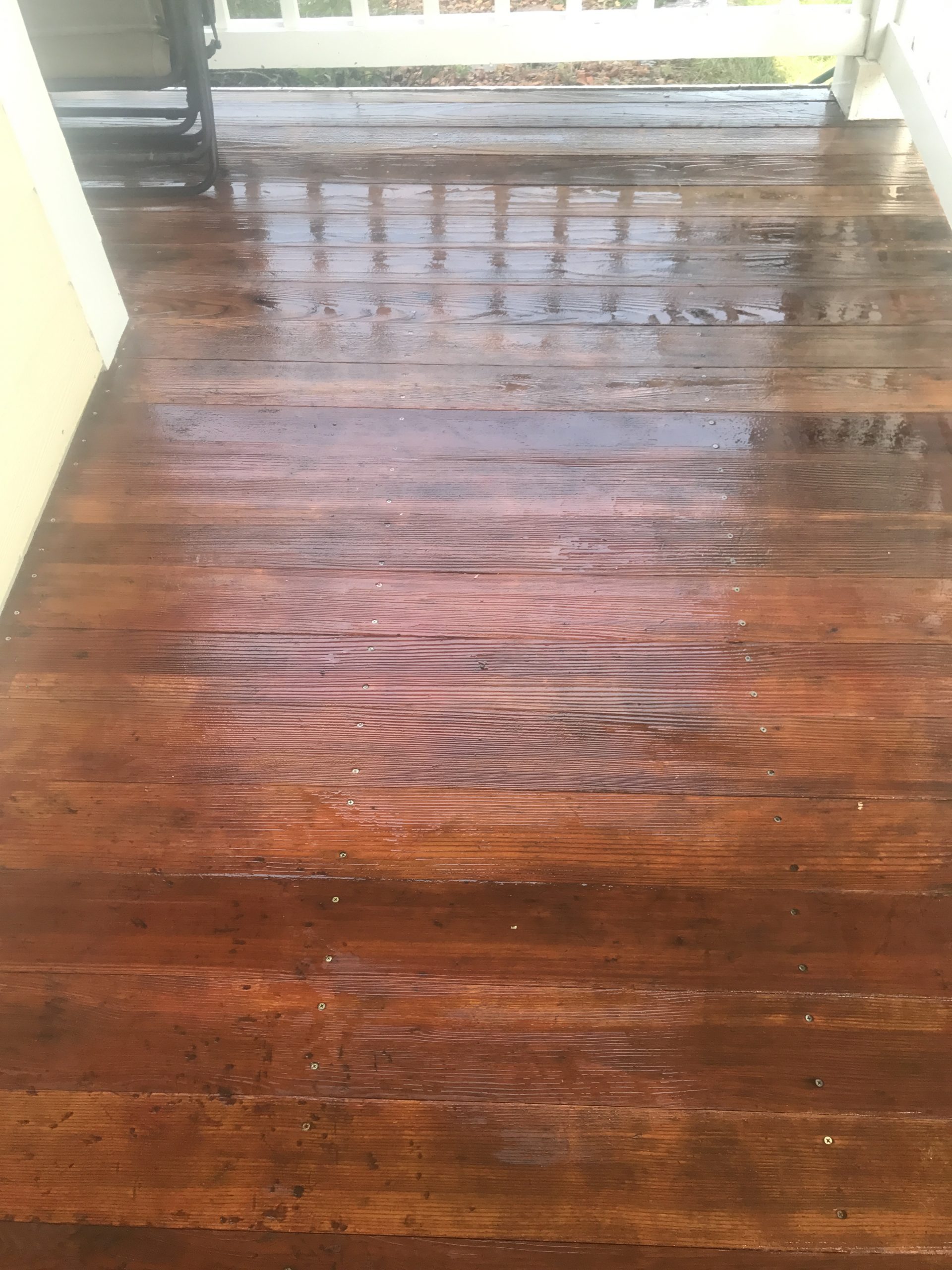 Pressure washing wood deck